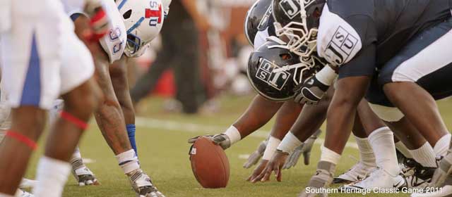 The Tennessee State University Tigers Defense lines up against Jackson State University on the gridiron during the 2011 Southern Heritage Football Classic before the ball is snapped.