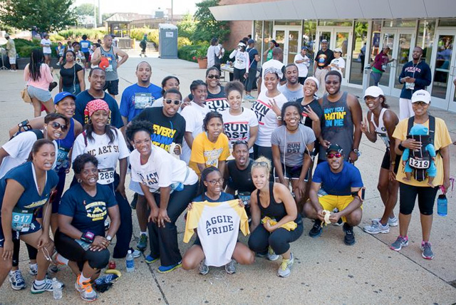 Group of HBCU alumni take a group photo after 2013 HBCU 5k race.