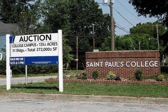 An auction sign posted in front St. Paul’s College after closing its doors in 2013. For HBCU Alumni this should be a wake up call that your alma mater might be next.