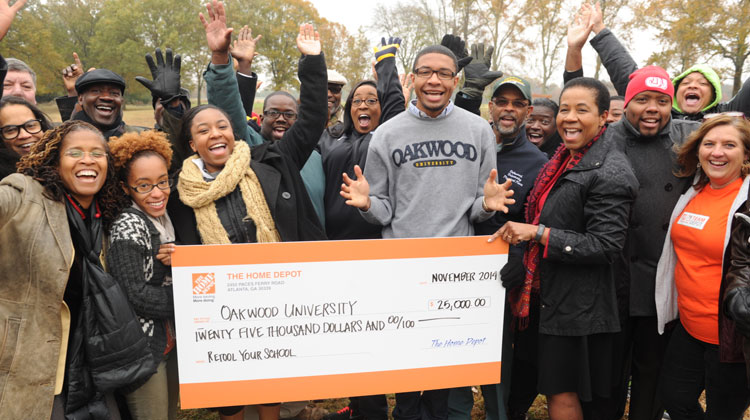 Oakwood University students and faculty celebrate winning one of the 2014 Retool Your School Campus Improvement Grants.