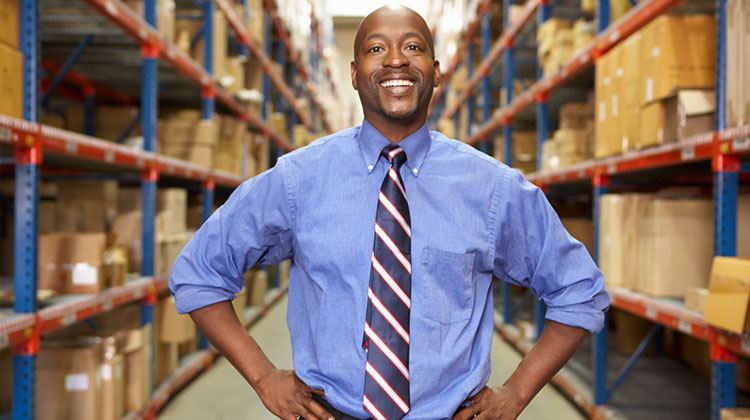 Portrait of a African American businessman in logistics warehouse