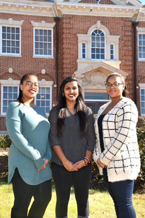 Claflin students, Meha Patel and twins Helen and Myrtle Bryant.