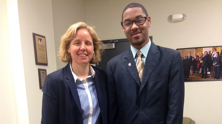 Michael DeVore, CEO of Live Chair Mobile App poses with Meagan Smith, the United States Chief Technology Officer & Assistant to President Obama, at the White House.