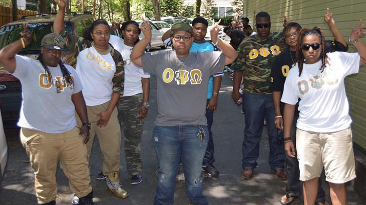 Be Unique - Black Greek Life: Members of Omicron Psi Omega, Inc. pose together.