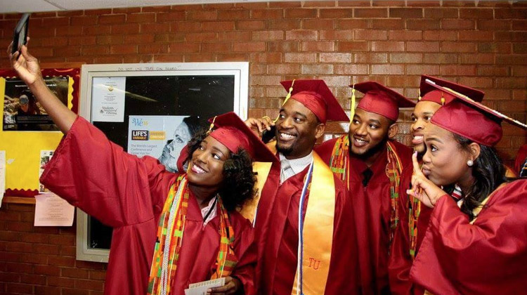 2016 Tuskegee Graduates take a group selfie at the Summer Commencement Ceremony.