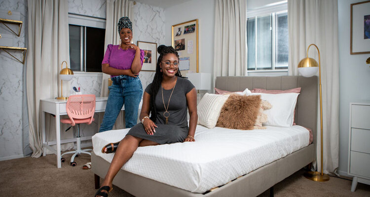 Interior designer Whitney Jones and Howard University graduate Brittany Goddard in her completed dream room makeover furnished by The Home Depot.