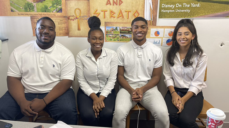 Winning Hampton University students pose in from of their Disney On The Yard Innovation Challenge project.
